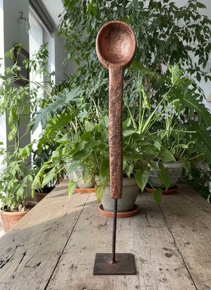 Vintage wooden spoons on stand