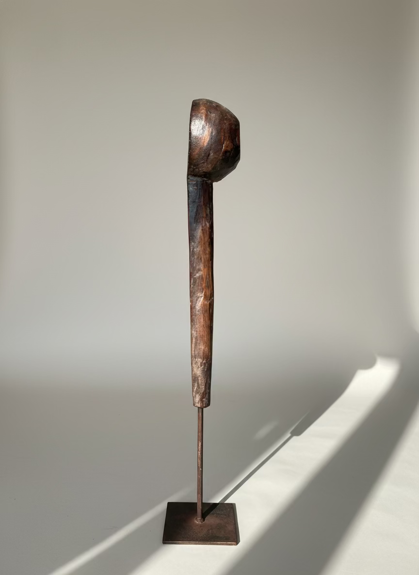 Vintage wooden spoons on stand