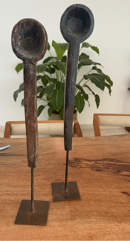 Vintage wooden spoons on stand