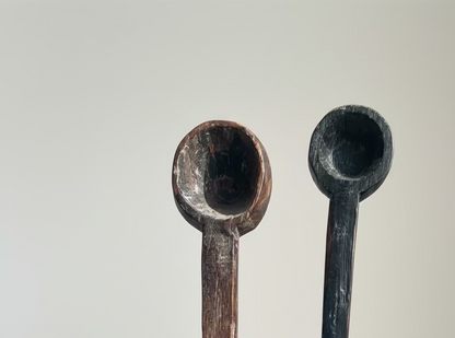 Vintage wooden spoons on stand