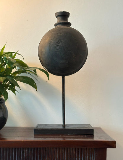 Handmade black pot on a stand 