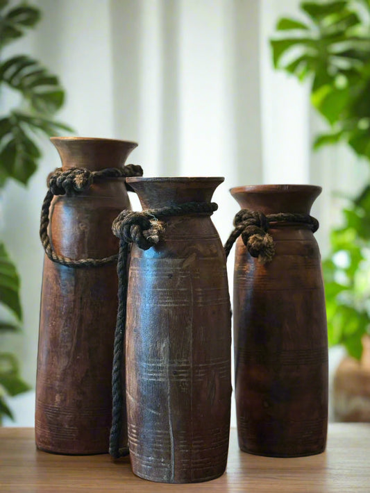 vintage Himalayan Wooden pot with a rope handle 