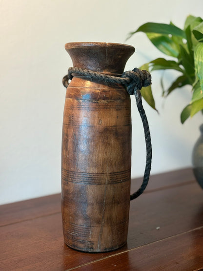 vintage Himalayan Wooden pot with a rope handle 