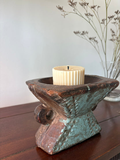 candle holder made from an old agricultural tool called a bijni from india